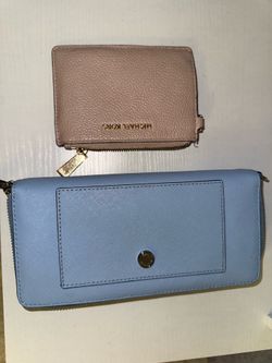 Two Michael Kors wallets
