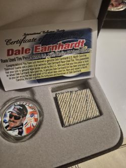 Vintage Dale Earnhardt coin and North Carolina Statehoood Quarter And Peice Of Race Used Tire
