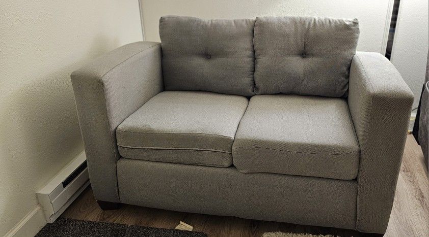 Grey couch/sofa 53 in / 34 in