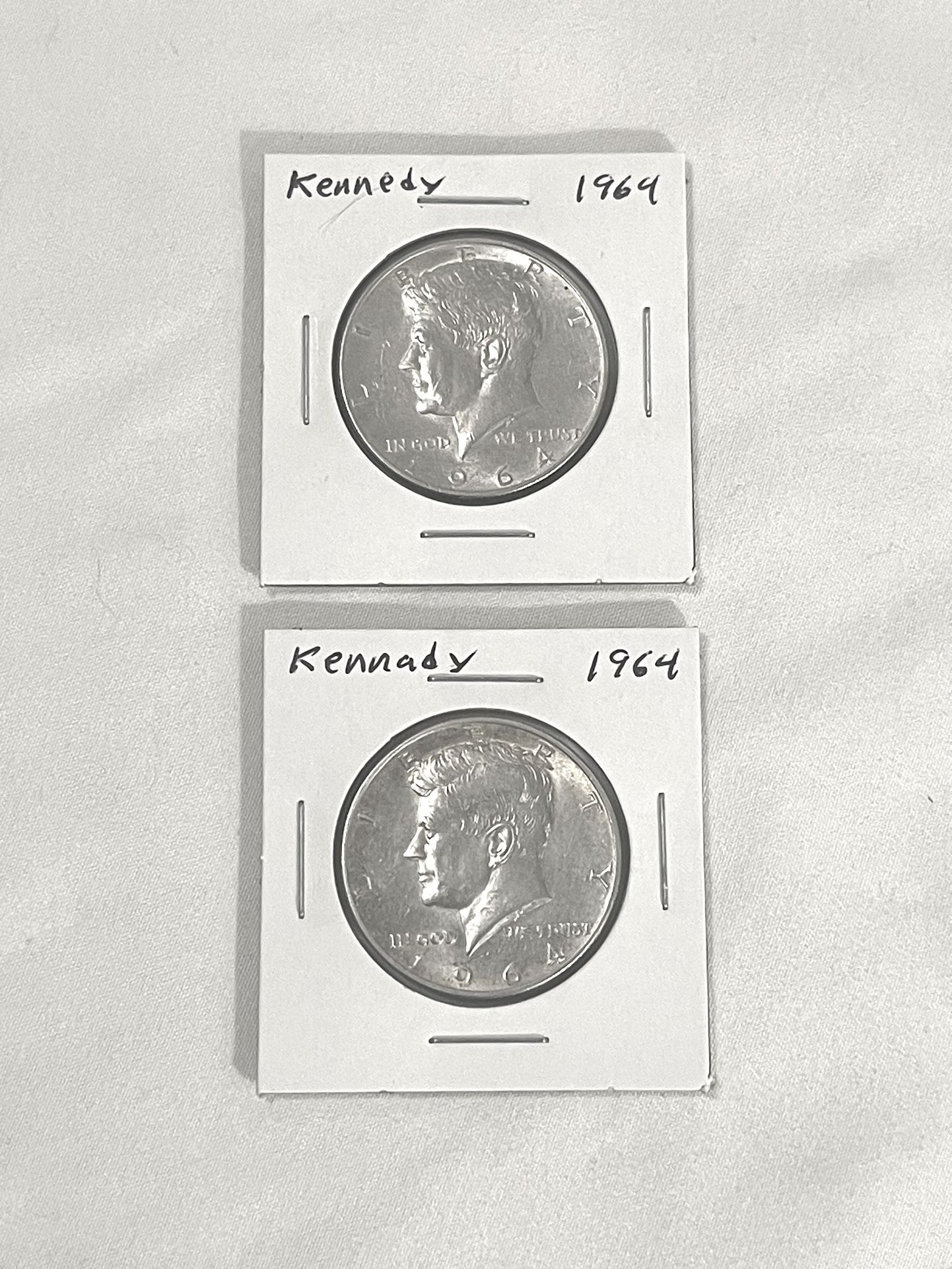 Uncirculated 1964 Kennedy Silver Half Dollars.
