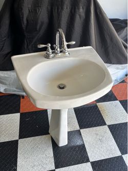 White pedestal sink
