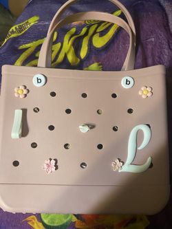 Brand new size, large beach bag towed in the color, pink lemonade