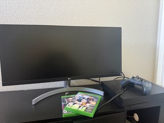 Xbox one X 1tb and LG Monitor w/Audio