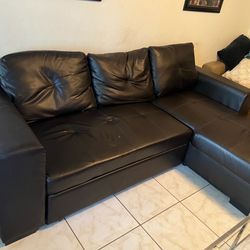 Dark brown sectional with storage