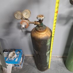 Welding Tank 26 Inches High.    Currently Holding Some Gas
