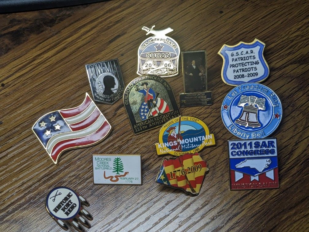 Group Of Pins And Brooches
