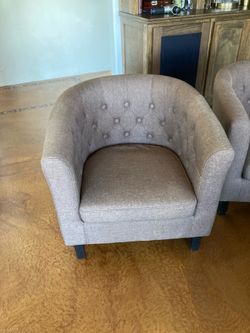 2 Brown fabric accent chairs