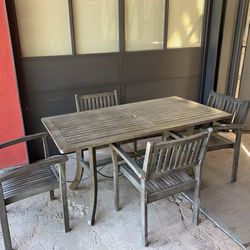 wooden patio table and chairs