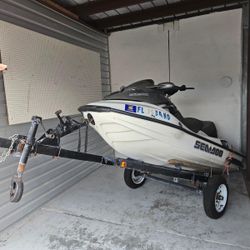 Jet ski Sea-Doo personal watercraft (PWC) on a trailer (comes With Trailer) 