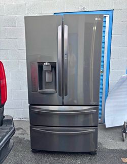Like new LG 27 Cu Ft French Door Refrigerator - Stainless Steel
