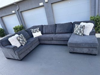 Large sectional couch with matching ottoman