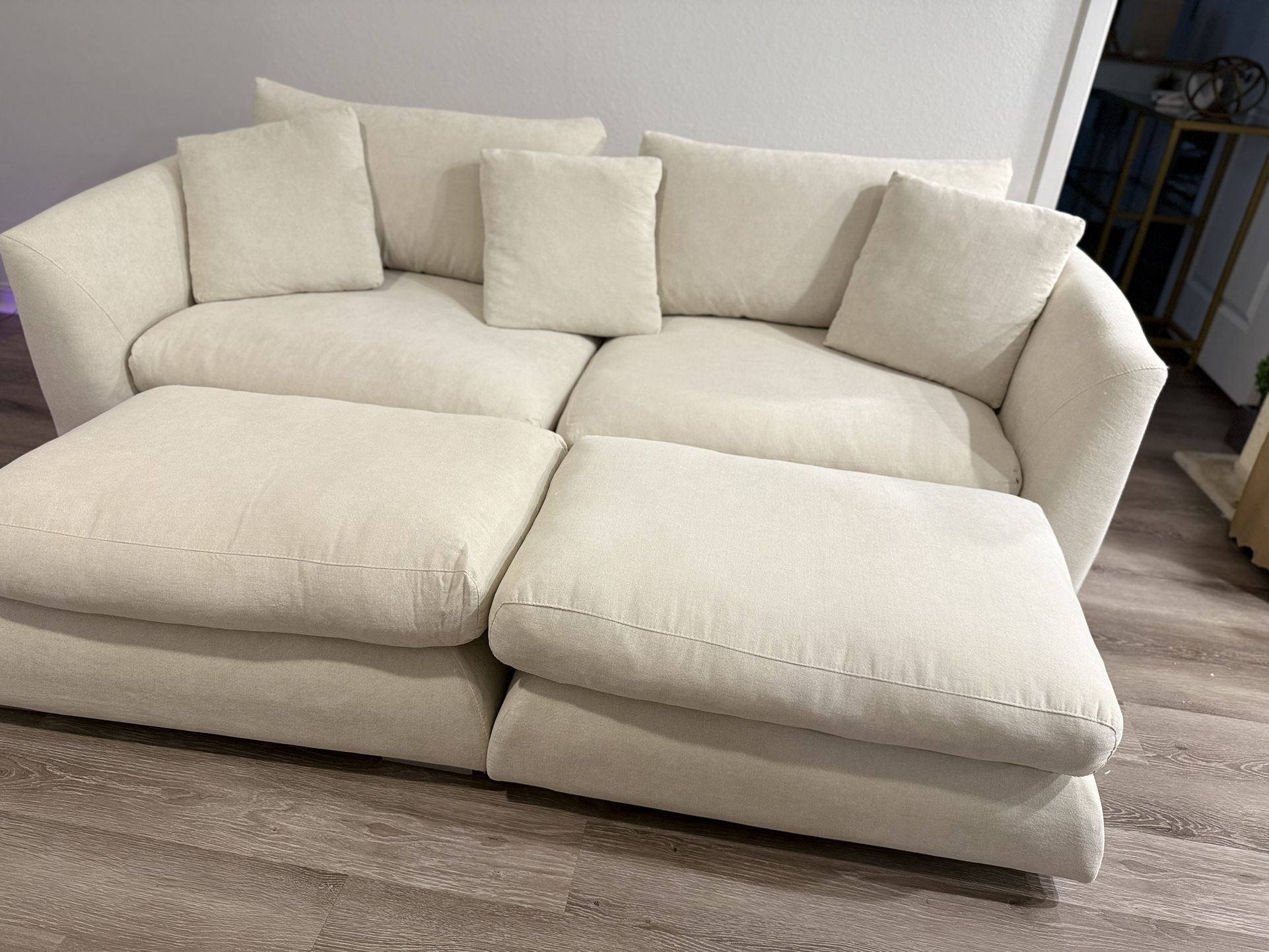 Feathers Sofa And Two Ottomans Like New