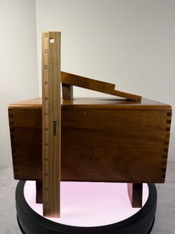 (1) Vintage wooden shoe shine box, la mid-century model featuring dovetail joints and an integrated footrest. Brushes & supplies.