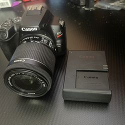 Description Canon rebel sl3 camera with 2 batteries charger and efs lens 18-55mm is stm ef-s