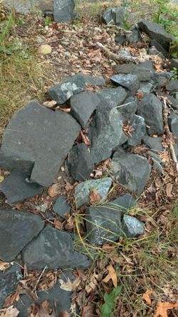 One man landscaping rock