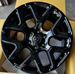 2026  RAM 1500 RIMS OEM BLACK NEW......( 20" INCH )