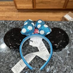 Disney Minnie Mouse Sequin Polka Dot Headband.  Brand new with tags never worn.  Smoke free home  
