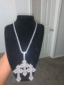 Beautiful iced out 20in tennis chain with cross pendant