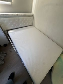 Full bed frame with matress.