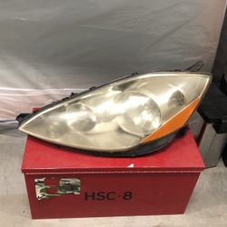 09 sienna driver side headlight assembly