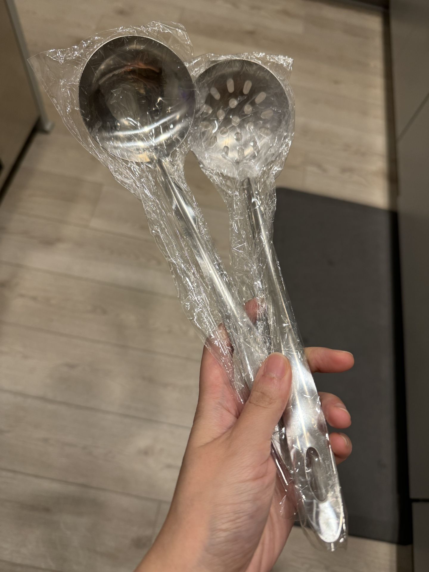 Brand new large spoon and large slotted spoon