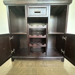 MOVE OUT SALE - Stylish Dark Wood Wine & Bar Cabinet – Holds 12 Bottles + Ample Storage!