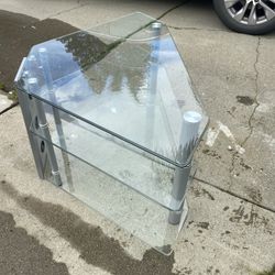 Glass corner table