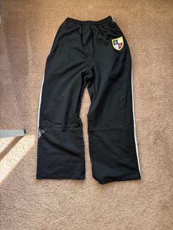 Black Track Pants with Side Stripe and Shield Patch