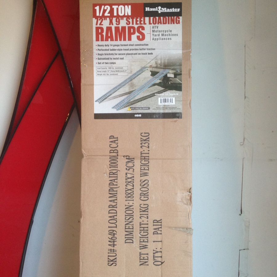 1/2 ton 72" x 9" steel loading ramps, never used