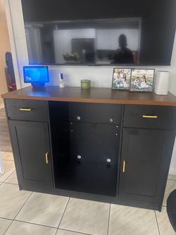 Black and Brown Stand with Cabinet Storage