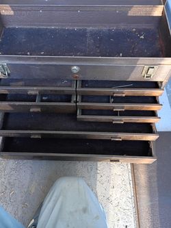 2 older heavy duty tool boxes with multiple sliding drawers