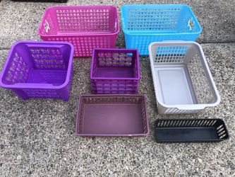 Several different plastic baskets
