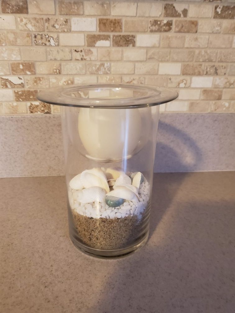 Battery operated shell candle holder