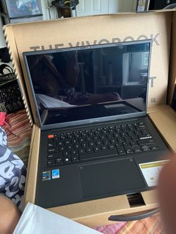 asus vivobook s oled laptop 14”