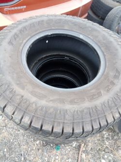 31/10.50/15 set of 4 tires like new
