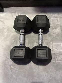 Two 25 lbs Hex cap dumbbells