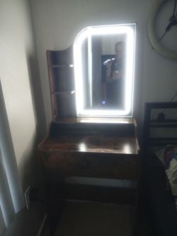 Illuminus Vanity mirror chest with shelves.