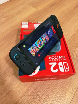 Nintendo Switch 2 - with extra controller, and case