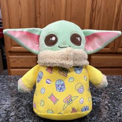 Star Wars The Mandalorian Easter Baby Grogu Plush.  Size appropriate 8 inches tall.  Brand new never played with.  No tag’s has been on display in a c