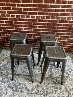Set of four metal barstools