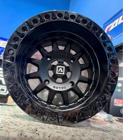 BIG SALE. On VALOR V09 15x10 4x156 Beadlock wheels & 33x10-15 TENSOR DSR TIIRES For 4 LUG SXS UTV (We Finance)