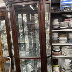 Heirloom Quality Howard Miller Curio Corner Cabinet  