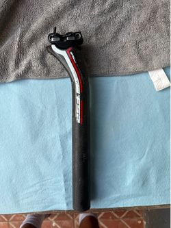 FSA - carbon fiber 25 mm seat post ready for any bike