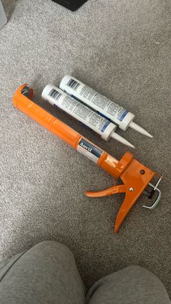 Caulking Gun + 2 Tubes Of Caulk