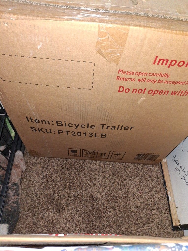 Dog Trailer Behind Your Bike.