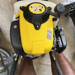 Champion Lawnmower, 53 Cc. Champion Earth Auger. Gas Power 53 Cc.