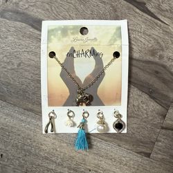 Charming assortment of 6 pieces, including a blue tassel, elephant, and more