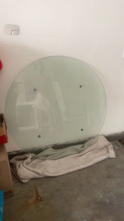 Dining table with glass top