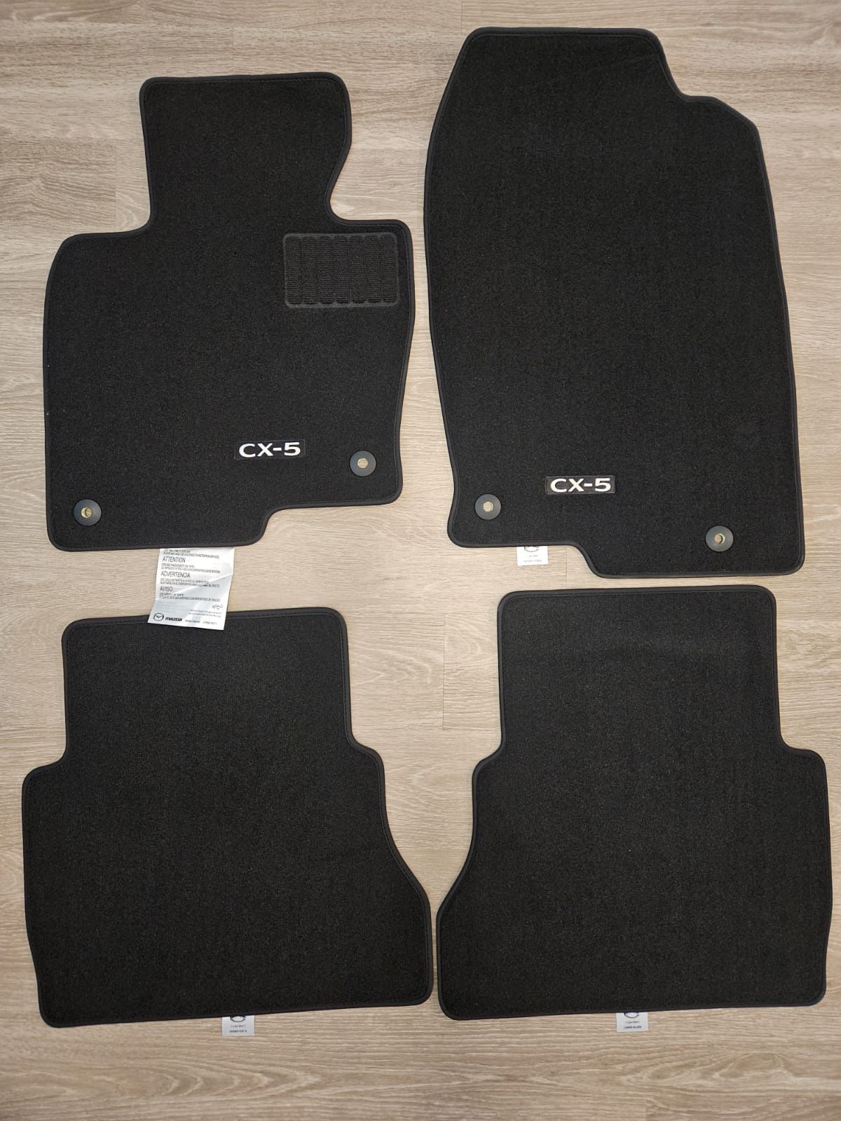 Genuine Mazda CX-5 floor mats, brand new, never used.