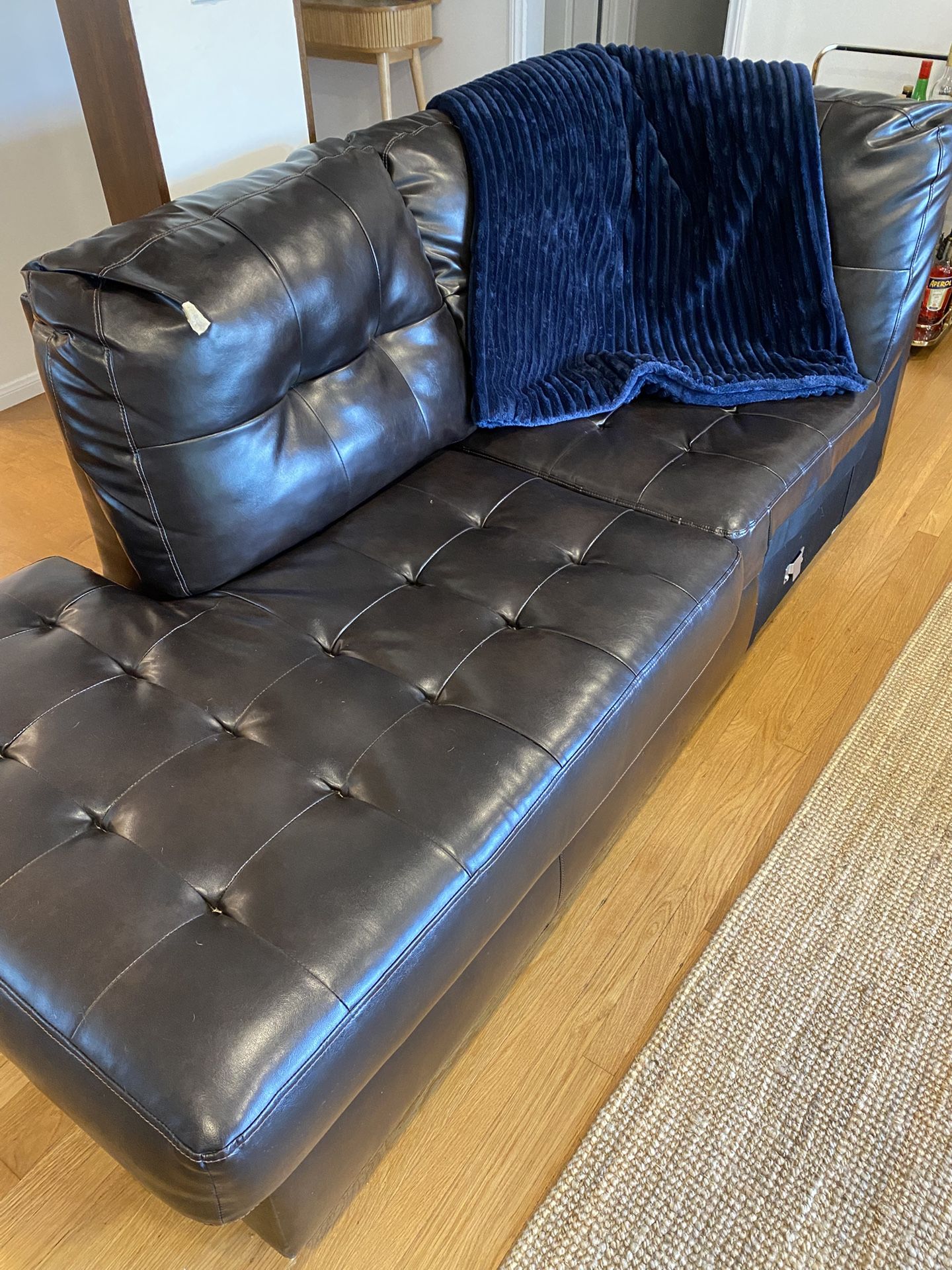 Living Spaces Black Leather Sectional